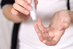 The finger-prick test is being examined in an international trial expected to conclude in 2028